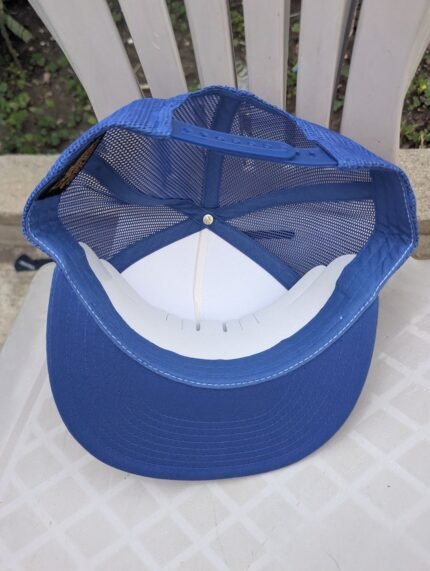 Interior view of Mexico National Team trucker hat showing royal blue mesh back, adjustable snap closure, and flat brim.