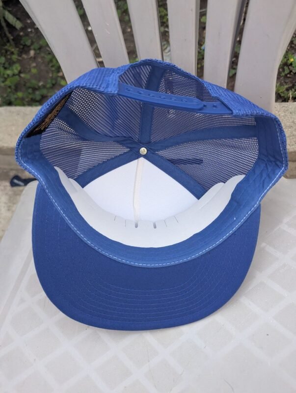Interior view of Mexico National Team trucker hat showing royal blue mesh back, adjustable snap closure, and flat brim.